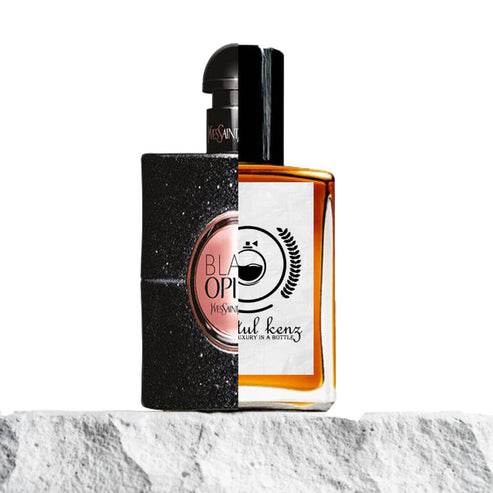 The image features a split view of two perfume bottles. The left side showcases the deep, dark red bottle of Yves Saint Laurent's Black Opium, with its sleek, rounded design and prominent black and white label. The right side represents Baytulkenz Perfumes, displaying a warm amber liquid and a white label with the Baytulkenz logo and branding. Both bottles are set against a stone-textured surface, providing a striking juxtaposition of the two perfumes' distinct styles.