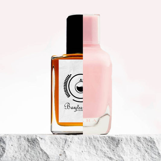 "A split image features two perfume bottles displayed side by side against a light background."
"On the left, a brown perfume bottle with a label, the Baytulkenz inspired version of Fizzy Pink Zara."
"The Baytulkenz bottle has a warm, amber hue with a sleek design, featuring a minimalist label with the Baytulkenz logo."
"On the right, a pink bottle, labeled Fizzy Pink Zara.
The Fizzy Pink Zara bottle has a soft, feminine design with a vibrant pink color, exuding a playful and refreshing vibe."