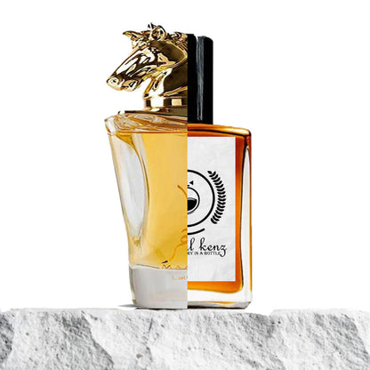 "A stylish perfume bottle featuring a gold horse-head cap, labeled Maahir Lattafa, showcasing a luxurious and bold design."
"The bottle holds a vibrant amber liquid, adding to its elegant and striking appearance."
"Beside it, a Baytulkenz inspired version of Maahir Lattafa, with a luxury label design reflecting the original’s sophisticated appeal."
"The Baytulkenz bottle mirrors the sleek elegance of Maahir Lattafa, with distinct branding and design details."