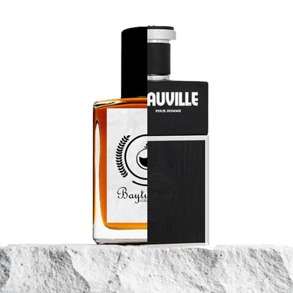 "Two cologne bottles are placed side by side on a textured white surface."
"On the right, a black-colored bottle is labeled "Sauville Pour Homme Armaf," featuring a sleek and elegant design."
"On the left, an amber-colored bottle represents the Baytulkenz inspired version of "Sauville Pour Homme Armaf."
"The black bottle stands out with its bold and classic look, while the amber bottle offers a warm, rich contrast."