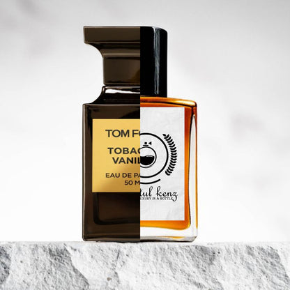 "A split image of two different perfume bottles against a stone background."
"On the left, a black-colored bottle with a gold label reading "Tom Ford Tobacco Vanille" is displayed."
"On the right, an amber-colored bottle represents the Baytulkenz inspired version of "Tom Ford Tobacco Vanille."
"The black bottle features a sleek, sophisticated design with gold accents, while the amber bottle contrasts with a warm, golden tone."